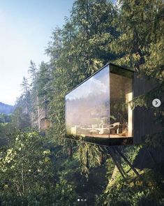 a tree house in the middle of some trees