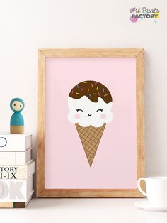 an ice cream cone with sprinkles on it is framed in a wooden frame