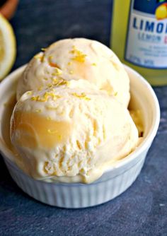 two scoops of lemon ice cream in a bowl