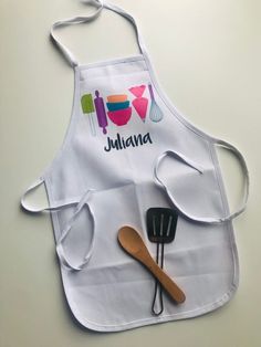 a personalized apron with utensils on it