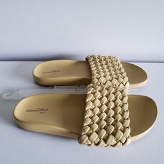 Contoured Footbed For Added Support Very Comfy And Lightweight Beige Flat Synthetic Slides, Beige Synthetic Slides For Summer, Beige Synthetic Summer Slides, Adjustable Beige Synthetic Slides, Beige Synthetic Slides With Woven Sole, Casual Cream Synthetic Slides, Cream Flat Synthetic Sandals, Cream Flat Slides For Spring, Gold Flat Sandals