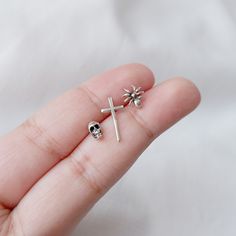 Real 925 Sterling Silver Mismatched Spider, Skull and Cross Stud Earrings These lovely earrings can be used in Earlobe, Second Earlobe hole, Cartilage, Helix and Tragus Piercings This set of earrings include 1 Spider, 1 Skull and 1 Cross Measurement: * Spider - 8x8mm * Skull - 6.5 x 4mm * Cross - 16.5 x 8mm Comes with pushback backings Jewelry will come in a gift box * Please read shop policy before placing an order * *JEWELRY CARE* Sterling Silver will tarnish over time, but to help keep your j Nickel Free Sterling Silver Punk Earrings, Nickel-free Sterling Silver Punk Earrings, Punk Sterling Silver Earrings, Edgy Silver Piercings As A Gift, Edgy Silver Piercings For Gifts, Silver Edgy Cartilage Earrings For Gift, Edgy Silver Cartilage Earrings As Gift, Edgy Silver Cartilage Earrings For Gifts, Nickel-free Sterling Silver Punk Cartilage Earrings