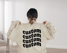 Custom Sweatshirt, Personalized Sweater, Customized Wavy Text Shirt, Custom Unisex Hoodies, Back Print Sweater, Trendy Woman Shirt Welcome to my BEB Tee Design store!  In my shop, you will find high quality Bella Canvas Brand T-Shirt. My shirts are soft and regular relax fit.  Hey! Don't forget to see the drop-down menus for the sizes and colors that you would like to order.  And it is so important to check the size charts in the listings.  These are the information below about my products and s Customizable Cotton Hoodie Tops, Custom Text Long Sleeve Sweatshirt For Streetwear, Customizable Long Sleeve Sweatshirt, Custom Text Long Sleeve Tops For Streetwear, Custom Text Relaxed Fit Long Sleeve Sweatshirt, Custom Text Long Sleeve Relaxed Fit Sweatshirt, Casual Cotton Hoodie With Custom Text, Casual Long Sleeve Tops With Custom Text, Casual Crew Neck Hoodie With Custom Text