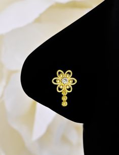 ✦ 𝐈𝐭𝐞𝐦 𝐃𝐞𝐬𝐜𝐫𝐢𝐩𝐭𝐢𝐨𝐧 This eye-catching Lily Flower Nose Stud is made with beautiful Citrine gems and comes with a 14k gold finish. Perfectly personalized for everyday wear or special occasions, it's sure to be a perfect gift for her. 𝐒𝐩𝐞𝐜𝐢𝐟𝐢𝐜𝐚𝐭𝐢𝐨𝐧 :- ■ Material : 925 Sterling Silver ■ Gemstone : Cubic Zirconia  ■ Finish : Available in Yellow Gold, Silver, Rose Gold, Black ■ Diameter : 12 X 10 MM ✦ Shipping Updates :--------- Processing Time : 1 working Days Shipping Tim Flower Nose Piercing, Flower Nose Stud, Gold Nose Stud, Rose Noir, Gold Nose Rings, Smoky Quartz Ring, Silver Gold Jewelry, Ring Flower, Nose Jewelry