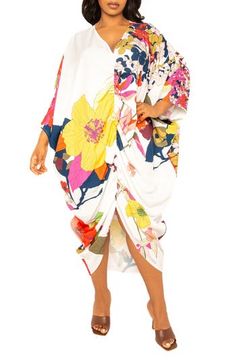 Enter the tropics everytime you slip into this vivid floral dress boasting a billowy caftan silhouette that's fit for your next paradise venture. V-neck Bracelet-length sleeves Unlined 95% polyester, 5% spandex Hand wash, line dry Imported Oversized Floral Print Maxi Dress For Spring, Multicolor Tropical Print Kaftan For Spring, Oversized Multicolor Dresses For Beach Season, Spring Dresses With Vibrant Print And Kimono Sleeves, Spring Tropical Dresses With Kimono Sleeves, Tropical Dress With Kimono Sleeves, Casual Floral Print Kaftan For Spring, Tropical Printed Kaftan For Spring, Spring Casual Kaftan With Floral Print