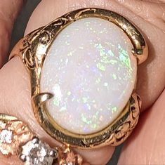 Custom Made Beautiful Estate Heavy 10k (Not Marked) Large Opal Ring. 8 Can Be Sized By A Jeweler. The Opal Is Brilliant And More Colorful When Worn. Elegant White Opal Collectible Ring, Collectible 14k Gold White Jewelry, Collectible White 14k Gold Jewelry, White Opal Ring Stamped 14k For Gift, White Opal Ring Stamped 14k As Gift, One Of A Kind Oval Opal Ring For Anniversary, Gold Opal Ring, Opal Ring Gold, Ring Color