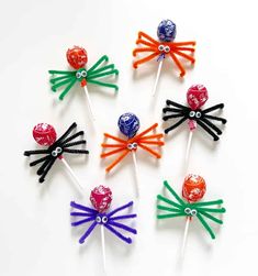 six candy lollipops in different colors and sizes