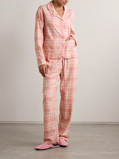 Skin's pajamas are made from organic cotton-flannel that offers extra warmth for chilly nights at home. It's printed with soft pink checks and has classic details, like a notched collar and drawstring pants. Cozy Plaid Cotton Sleepwear, Plaid Cotton Sleepwear For Sleepover, Plaid Cotton Sleepwear, Cotton Plaid Sleepwear For Loungewear, Plaid Cotton Sleepwear For Loungewear, Cotton Plaid Sleepwear For Bedtime, Plaid Cotton Sleepwear For Bedtime, Cotton Plaid Sleepwear For Home, Plaid Cotton Sleepwear For Home