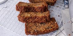 slices of banana bread sitting on top of a cooling rack