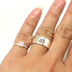 "Om Wedding and Engagement Ring. You will get a set of 2 rings or 1 ring of your choice. Please write your size/sizes at the personalize section. Base Material: 925 Sterling Silver Men Ring Depth: 9mm Women Ring Depth: 5mm Metal Stamped: 925 Thickness: 1.5mm Ring Size: We can make from US 4 - 14. We accept half-size. Please state after order. SPECIAL ANNOUNCEMENT 1. Please visit https://www.etsy.com/shop/yhtanaff for more designs. 2. Subscribe our newsletter to receive a Coupon Code for 10% disc White Symbolic Promise Ring, Symbolic White Promise Ring, Couples' Sterling Silver Rings For Gifts, Couples Sterling Silver Rings For Gift, Couples' Sterling Silver Rings As Gifts, Couples' Sterling Silver Gift Rings, Symbolic Adjustable Rings For Anniversary, Symbolic Stackable Wedding Rings, Adjustable Sterling Silver Couple Rings For Wedding