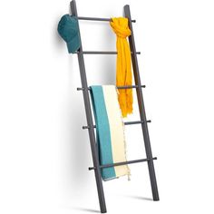 a towel rack with two towels hanging from it's sides and a hat on top