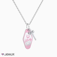 Inspired by retro keychains, this miniature keychain charm of luck features colored paint options. The tiny key is perfect for engraving initials, a meaningful number or year. Perfect for everyday wear, this necklace features a choice of chain lengths. Wear alone or layer with multiple necklaces to complete your look. Design your own in sterling silver, white, yellow or rose gold. Made just for you. Retro Keychains, Retro Keychain, Multiple Necklaces, Pink Slides, Engraved Initials, Keychain Charm, Lucky Horseshoe, Pink Design, Recycled Gold