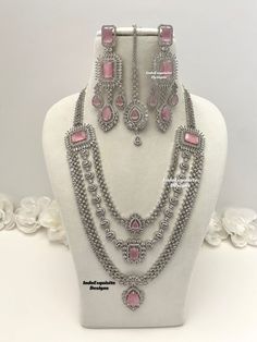 Three layered American Diamond long Necklace Set / CZ Necklace/Indian Jewelry/ Reception Jewelry/ Bollywood Jewelry/triple layer long necklace/Silver pink  All items are shipped from Brampton, Ontario, Canada. If you need your item by a certain day, please reach out to us for express delivery option before placing the order so that we can update the shipping for you. Standard shipping/delivery timeline Below are the estimated delivery times after the order is shipped/dispatched.  ---> USA delive Silver Layered Jewelry For Party, Layered Silver Jewelry For Parties, Layered Silver Necklaces For Parties, Silver Layered Long Necklace, Layered Long Silver Necklace, Pink Multi-strand Jewelry For Party, Long Silver Necklace, Bollywood Jewelry, Cz Necklace