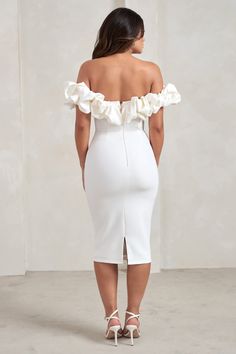 Make an elegant entrance at that upcoming wedding in our eye-catching Estie midi dress. Crafted from a white crepe that's both luxurious and sculpting. this bodycon dress boasts a statement Bardot neckline with a voluminous puff trim that wraps into draped sleeves. Complement Estie's classic design with diamond earrings and strappy silver heels.Features- Premium stretch crepe- Bardot neckline - Statement puff trim- Off-shoulder sleeves- Bodycon fit- Invisible zip closure- Split hemline- Midi len Graduation Suit, White Puff Sleeve Dress, Elegant Entrance, Grad Outfits, Bardot Midi Dress, Shower Dress, Draped Sleeves, Bardot Neckline, Voluminous Sleeves