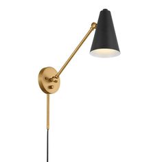 a black and gold wall lamp with a white light on it's side, against a white background