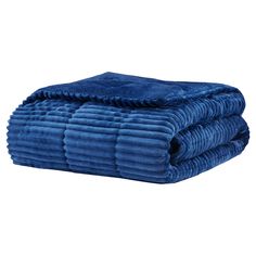 the blue blanket is folded on top of each other and ready to be used as a bed