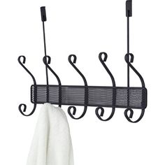 three hooks are hanging on the side of a refrigerator