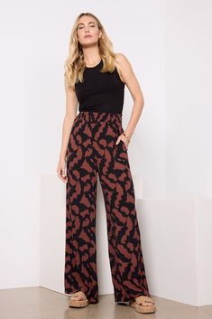 Fun and flowy, these printed pants will instantly elevate your summer wardrobe, featuring a relaxed wide leg, smocked elastic waistband, and side pockets. Take them from day to night with a tank and your favorite sandals. Clothing Trends, Wide Leg Pant, Printed Pants, Bottom Clothes, Summer Wardrobe, Get Dressed, Smocking, Wide Leg Pants, Latest Fashion Trends