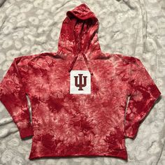 Nwt Indiana University Tie Dye Hoodie Sweatshirt Red Tie Dye With Iu Printed In Front Raw Hem Size Small Measurements Laying Flat Underarm To Underarm 24” Length 23 1/2” Make Me An Offer! Check Out My Other Nwt College Gear! Collegiate Red Hoodie Top, Collegiate Red Hooded Top, Red Cotton Top With Drawstring Hood, Red College Hoodie With Drawstring, University Red Hooded Cotton Top, Red College Top With Drawstring Hood, Red Drawstring Hood Top For College, University Red Cotton Hoodie For Fall, Red Tie Dye