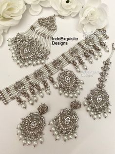 Elegant Pakistani bridal set/Pakistani Jewelry/ Indian and Pakistani wedding jewelry/ Bollywood jewelry/ kundan and Polki jewelry This elegant choker set comes with Earrings, tikka and Jhoomer/Passa/ Silver color  All items are shipped from Brampton, Ontario, Canada. If you need your item by a certain day, please reach out to us for express delivery option before placing the order so that we can update the shipping for you. Standard shipping/delivery timeline Below are the delivery timeline estimates. We dispatch all orders by the next business day. ---> USA delivery timeline * 2-6 business days to major urban centers in USA. It may take 1-2 days extra to remote locations ---> Canada delivery timeline  * 2-3 business days - GTA  & Montreal  * 2-4  business days - Rest of Ontario/Quebec * 2 Pakistani Wedding Jewelry, Brampton Ontario, Elegant Choker, Jewelry Kundan, Bollywood Jewelry, Polki Jewellery, Pakistani Jewelry, Choker Set, Jewelry Indian