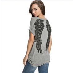 Ladies angel wings tee size large. New L or XL Gray tee with angel wings on the back new in package. These are Asian sizing so extra-large size is tagged extra extra large Tops Tees - Short Sleeve Angel T-shirts, Elegant Shirt, Loose Tops, An Angel, Women's Summer Fashion, Plus Size T Shirts, Print T Shirts, Angel Wings, Short Tops