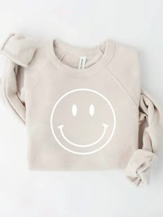 This Smiley face Sweatshirt is giving us all the cozy happy vibes! The softness of this crewneck is unbelievable!! Material and Care: 52% Cotton 48% Polyester Machine Wash warm inside out, with like colors. Tumble dry low. Sizing: Unisex relaxed fit For a loose fit, you may size up Smiley Face Sweatshirt, Product Promotion, To Do Today, Online Clothing Boutiques, Workout Sweatshirt, Smiley Face, Fleece Fabric, Street Fashion, Online Clothing