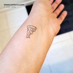 a small tattoo on the arm of a person with a slice of pizza in it