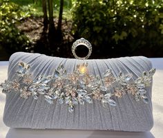 Fabulous design with a glittering touch.  Perfect finishing touch for any formal outfit.  Ideal for cocktail party or wedding.  Can be made in silver, gold or black.  Purse measures 7.5 x 4.8 inches Elegant Rectangular Evening Bag With Sequins, Elegant Sequined Evening Bag For Events, Elegant Sequined Clutch Evening Bag, Elegant Sequined Evening Clutch Bag, Elegant Sequined Evening Bag, Elegant Embellished Party Clutch, Rhinestone Clutch Evening Bag For Wedding Guest, Elegant Rhinestone Evening Bag For Events, Elegant Formal Bags With Sequins