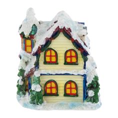 a small house with snow on the roof and trees around it's windows in front of a white background