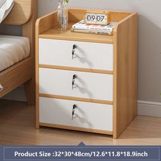 a white and wood dresser with drawers next to a bed