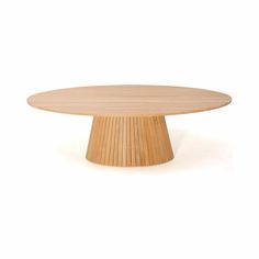 a round wooden table on a white background with no people around it or in front of the camera