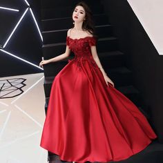 Off-shoulder Evening Dress For Homecoming And Prom, Off-shoulder Gown For Banquet And Prom Season, Off-shoulder Gown For Banquet During Prom Season, Off-shoulder Gown For Prom Season Banquet, Floor-length Off Shoulder Dress For Wedding And Prom, Off-shoulder Red Dress For Homecoming, Red Off-shoulder Homecoming Dress, Red Off-shoulder Dress For Homecoming, Red One Shoulder Gown For Wedding