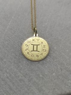 "Gemini Necklace - Engraved Gemini Charm - Gold Zodiac Charm - Gold Astrology Pendant ▪️ A beautiful and clean engraved Gemini pendant made out of 14K Solid Real Gold. Available only in yellow gold! Dimensions - Small - 16x16mm / 0.62 x 0.62 inches Medium - 18x18mm / 0.70 x 0.70 inches Big - 20x20mm / 0.78 x 0.78 inches Necklace Length - You can choose your chain length from 35CM to 50CM. The pendant is available alone without a chain, select \"No Chain\" on the necklace length section. ▪️ We ca Symbolic Zodiac Sign Gold Plated Jewelry, Symbolic Gold Plated Zodiac Sign Jewelry, 14k Gold Zodiac Sign Medallion Jewelry, Anniversary Gold Plated Zodiac Sign Jewelry, Symbolic Yellow Gold Zodiac Jewelry, Symbolic Yellow Gold Jewelry With Zodiac Sign, 14k Gold Zodiac Sign Jewelry, Yellow Gold Zodiac Sign Jewelry For Anniversary, 14k White Gold Zodiac Sign Jewelry