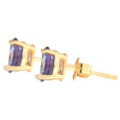 Stamped: 14K Total Earring Weight: 1.2 Grams Gemstone Weight: Total Natural Tanzanite Weight is 2.30 Carat Quantity: 2 Main Stone Color: Blue Face Measure: 6.50x6.50mm SKU: [703287] Tanzanite Yellow Gold Earrings For Anniversary, Yellow Gold Tanzanite Earrings For Anniversary, Formal Gold Tanzanite Earrings, Oval Tanzanite Gemstone Earrings, Purple Tanzanite Gemstone Earrings, Blue Tanzanite Brilliant Cut Earrings, Formal Tanzanite Multi-stone Gemstones, Classic Tanzanite Multi-stone Jewelry, Natural Tanzanite