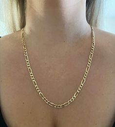 14k Figaro gold chain. Material: 14k solid gold. Measurements: 20, 22, and 24 inches. Weight: depending on length weight can vary from 14 grams to 17 grams. Width: approximately 5mm wide.  Comes in a nice box. Mens Gold Chains, Pear Shaped Diamond Ring, Morganite Engagement Ring Set, Gold Chains For Men, Morganite Engagement, Figaro Chains, Figaro Chain, Morganite Engagement Ring, Morganite Ring