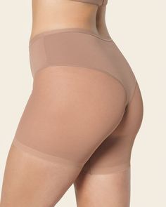 Shape your curves and prevent chafing at the same time! This slip short is made of a super soft and comfy compression fabric to smooth out your tummy and shape your waist. It has a sheer short bottom for an invisible look under clothes, plus this design helps reduce chafing under skirts and dresses. The thong effect in the back offers a light butt-lifting effect. Go ahead and wear this slip short under fitted clothes – it won't show through! Fitted Clothes, Shape Your Waist, Under Skirts, Slip Shorts, Skirts And Dresses, Leg Bands, Sheer Shorts, Compression Fabric, Everyday Bra