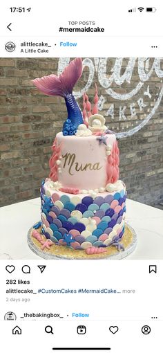 there is a cake that has been decorated to look like a mermaid on the bottom