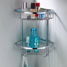 two tiered shower caddy with soap and lotion bottles on the bottom shelf