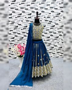 This exclusive Designer Kids Lehenga-Choli Set is crafted from premium Fox Georgette and adorned with dazzling 5mm sequence embroidery work, making it a must-have for your child's festive wardrobe. The fully stitched fancy choli features a back-side hook patti and comes with extra sleeves for added versatility. The lehenga includes latkan dori details, while the heavy georgette dupatta is finished with an elegant lace border.

Available in sizes for 3 to 15 years, this set ensures a perfect f... Fancy Choli, Saree Bollywood, Bollywood Saree