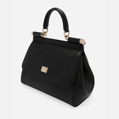 Indulge in luxury with the Sicily Medium Handbag. Crafted with the finest Dauphine calfskin, this iconic bag exudes understated elegance. Its feminine design is accentuated by the logo tag featuring two metal plating finishes. Make a statement with this must-have accessory. Dolce And Gabbana Handbags, Medium Handbags, Backpack Travel Bag, Iconic Bags, Logo Tag, Feminine Design, Understated Elegance, Wallet Bag, Phone Bag