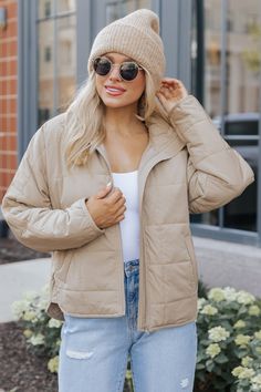 Bundle up in style with the Taupe Zip Up Puffer Jacket, a must-have for staying cozy and on-trend during chilly weather! The zip up front allows for easy layering and practical wear, making it ideal for everyday outings. Made from soft puffer material, this jacket provides ultimate comfort while keeping you insulated against the cold. Style with jeans, ankle booties, and matching accessories to complete the look. Revival Clothing, Fall Style Guide, Gameday Dress, Casual White Dress, Game Dresses, Matching Accessories, Basic Tops, Blazer Coat, Denim Shop