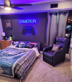 a bed room with a neatly made bed and a neon sign above the headboard