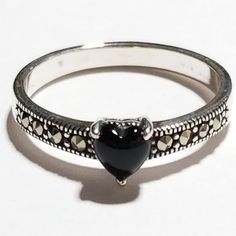 Sterling Silver Ring With A Genuine Black Onyx Heart Center Stone, Clear Cz Down The Marcasite Shank. Marked Sterling Silver 925 Black Onyx Non Smoking/Pet Friendly Home Black Sterling Silver Heart Ring Gift, Gift Black Sterling Silver Heart Ring, Thick Wedding Bands, Heart Center, Wedding Bands For Her, Ring Color, Black Stone, Black Rings, Womens Jewelry Rings