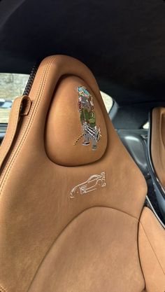 the interior of a car with an animal sticker on it