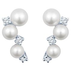 These earrings from Mikimoto feature six graduating Akoya pearls measuring 3.25mm, 3.75mm and 4.25mm accented by scattered round diamonds. set in 18 karat white gold. These come with the original Mikimoto box. Measurements: Length approximately 12.85mm. Condition: Excellent. No visible signs of wear. Earring Video, Akoya Pearl Necklace, Pearl Clasp, Diamond Cluster Earrings, Mikimoto Pearls, Bar Stud Earrings, Pearl And Diamond Earrings, Circle Diamond, Akoya Pearls