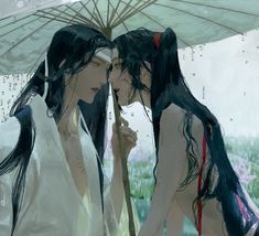 two women standing under an umbrella in the rain