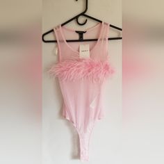 Women's Forever 21 Sheer Pink Sleeveless Bodysuit With Pink Soft Feather Across The Bust. New With Tags. Sexy And Feminine. Measurements; Pit To Pit 16 Inches (Unstretched), Length 23 1/2 Inches (Unstretched). Glamorous Spring Club Tank Top, Fitted Tank Top For Summer Clubbing, Fitted Tank Top For Club In Summer, Fitted Tank Top For Club And Summer, Fitted Tank Top For Spring Clubbing, Fitted Tank Top For Club In Spring, Fitted Tank Top For Club Nights In Spring, Fitted Tank Top For Club And Spring Season, Trendy Summer Party Tank Top