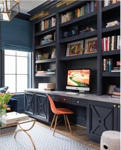 an image of a home office with bookshelves and desks on it's shelves