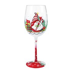 a wine glass with an image of a santa clause riding a sleigh on it