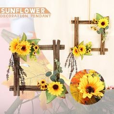 the sunflower decorations are hanging on the wall and in front of it is a wooden frame with flowers